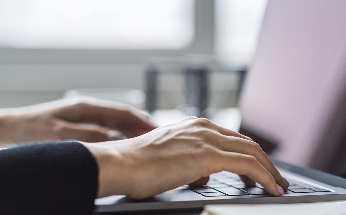 Hands at a keyboard
