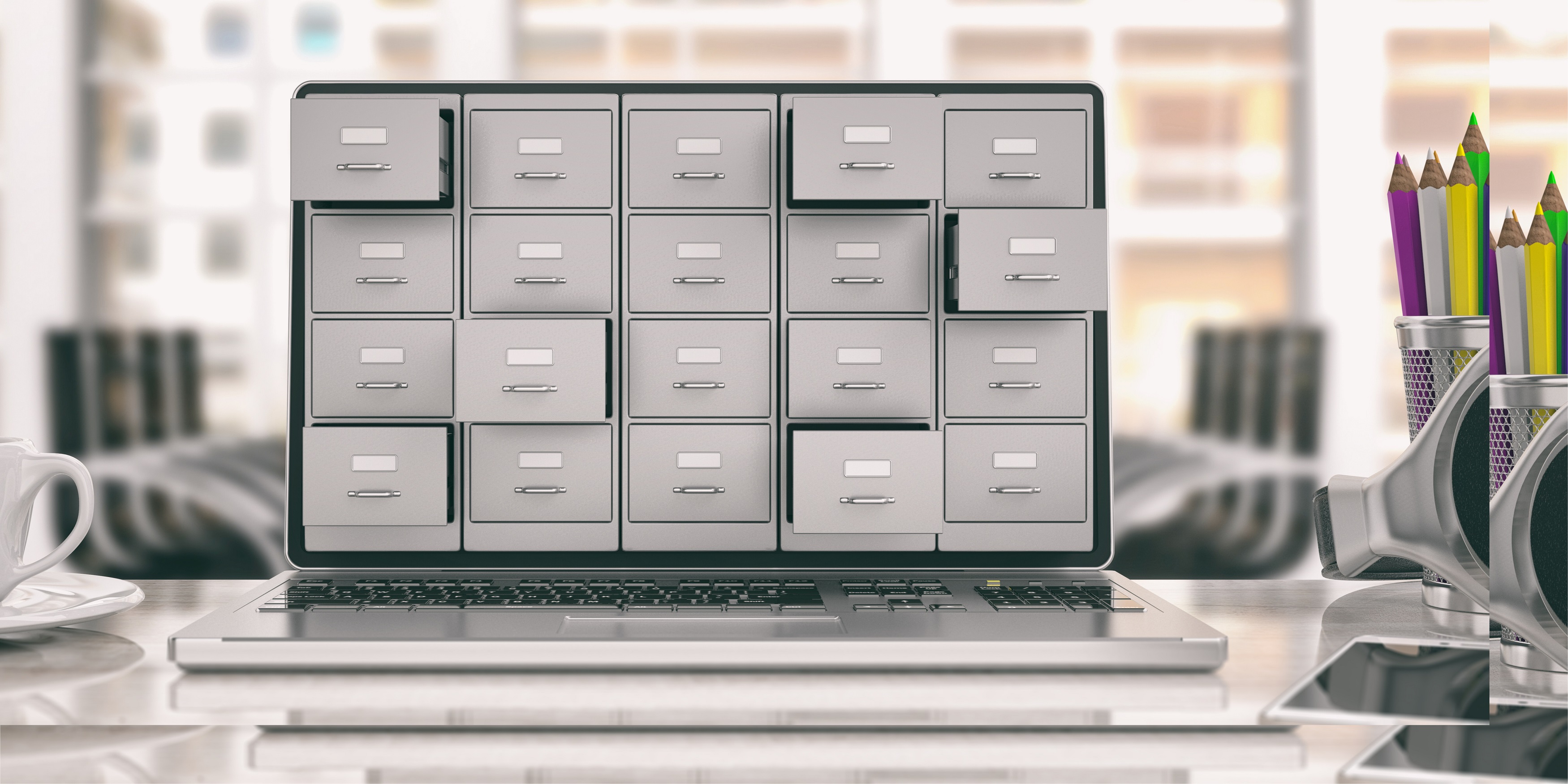 Laptop with filing cabinet drawers sticking out from the screen.